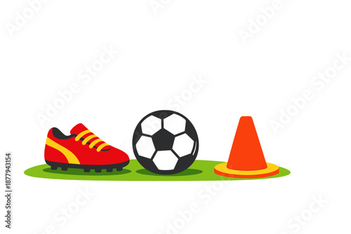 Soccer equipment on a green field with a dark background