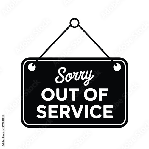 Black sign displaying sorry out of service hanging from a white cord