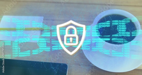 Displaying holographic shield padlock hovering over wooden desk, showing cyan code, coffee cup