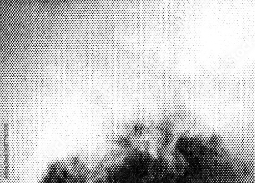 Foto Extreme macro of black printer halftone dots forming soft clouds and sky gradien