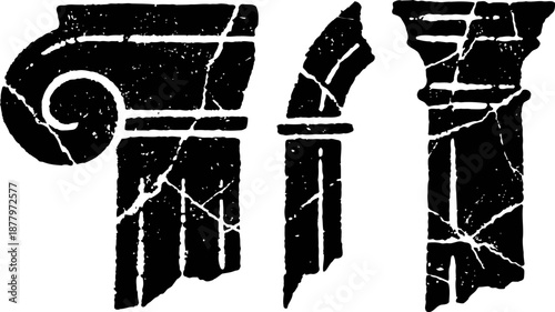 Ancient broken ionic column capitals with cracks and weathered surface design elements