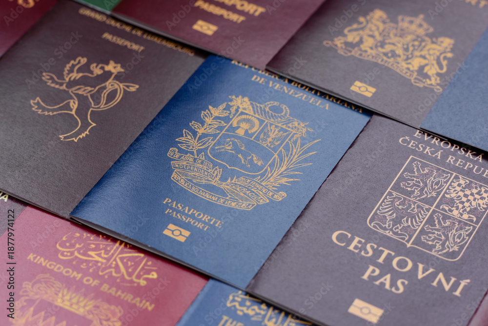 Fototapeta premium Passports of citizens of different countries of the world. Passports background