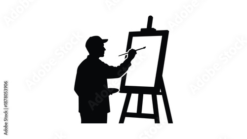 a man painting on an easel with a brush