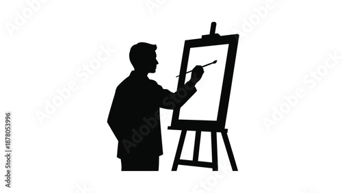 a man painting on an easel with a brush