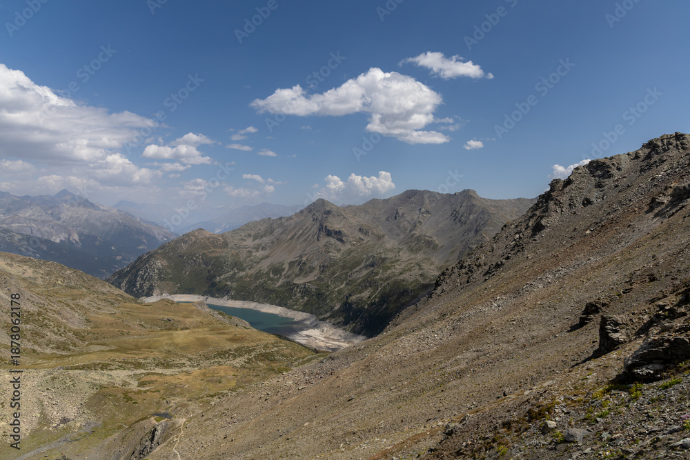 Obraz premium Panoramic alpine view from Col des Marches overlooking the Maurienne Valley near Valmeinier in the French Alps.