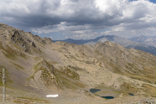 Panoramic alpine view from Col des Marches overlooking the Maurienne Valley near Valmeinier in the French Alps.