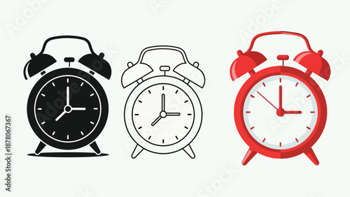 Three different colored alarm clocks side by side