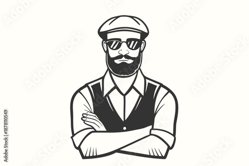 Bearded man wearing glasses and a cap stands with arms crossed confidently