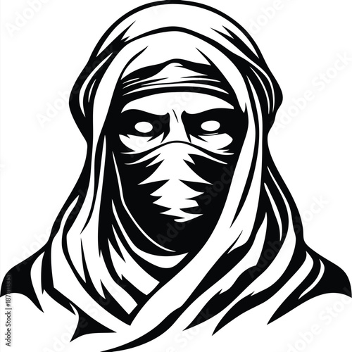 Grim middle eastern figure wearing a keffiyeh mask conveys intensity in monochrome