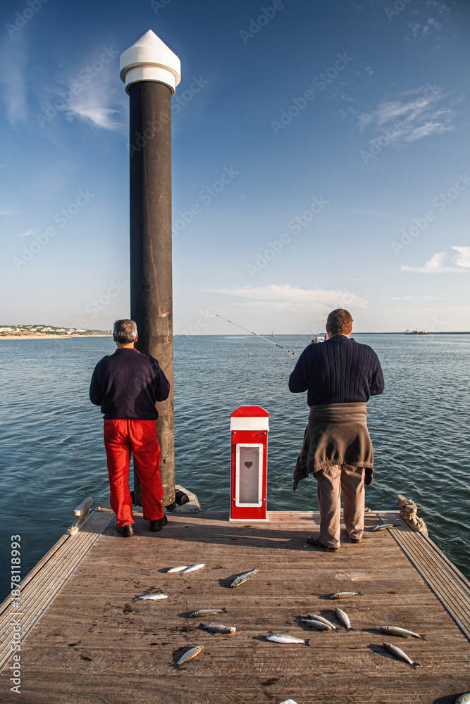 Fototapeta premium Fishermen Catching Sea Bass, Odiel River, Huelva, Spain