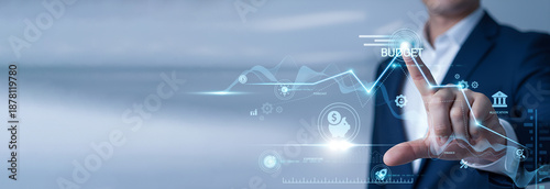 Принти на полотні Financial manager pointing at data network and Budget on digital interface
