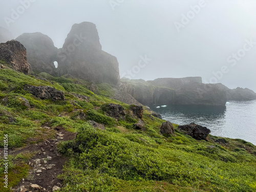 Foggy Volcanic Rock Formations on the South Coast of Disko Island, Greenland