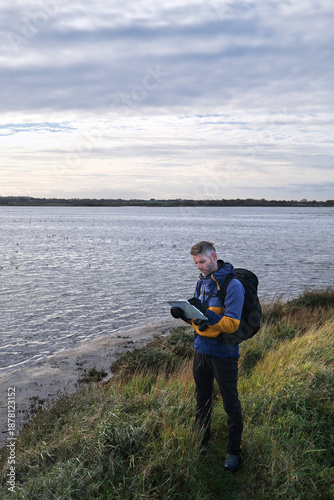 Photos Environmental Scientist Monitoring Water Quality for Chemical Pollutants and Hab