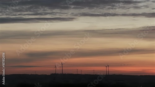 New Energy wind mill during sunset phase in Bavaria area