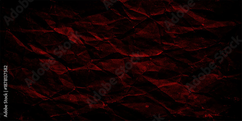 A dark red grunge wall texture with a dirty paint design creates a hot fire and blood color backdrop featuring a burnt black surface pattern on old paper for an artistic wallpaper