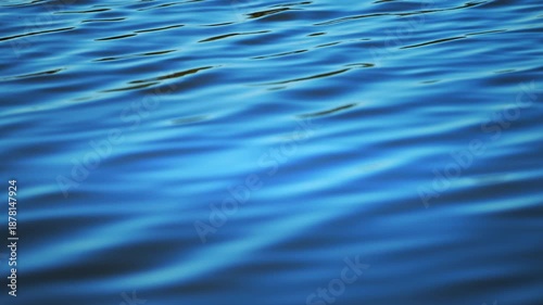 Clean blue water waves moving softly, calming nature footage in cinematic 4K slow motion