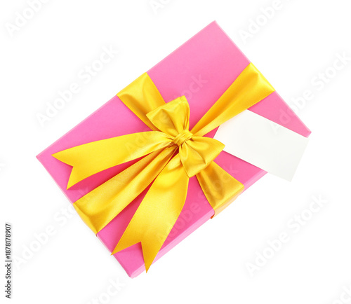 Beautiful wrapped gift with blank card isolated on white, top view