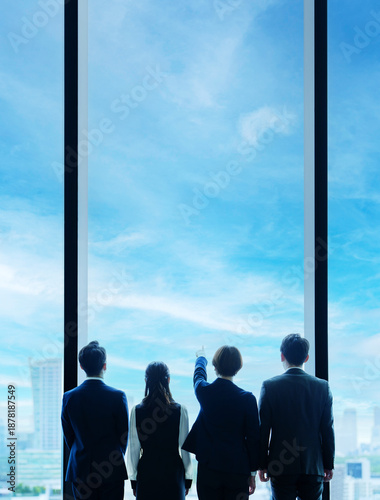 Tableau sur toile 空に向かって指を指すビジネスパーソンの背中