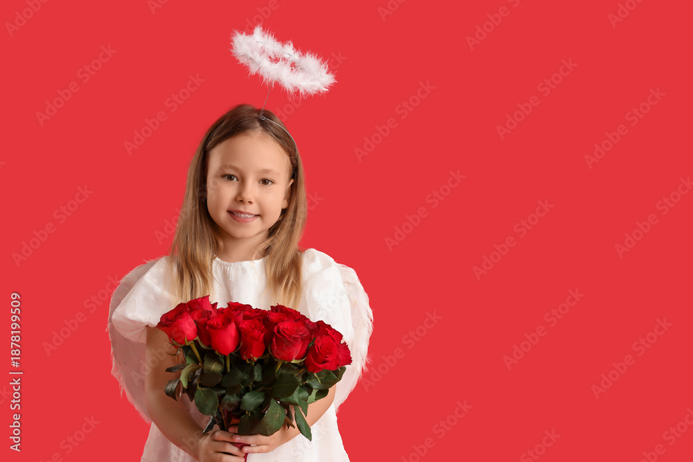 Fototapeta premium Cute little girl dressed as cupid with bouquet of beautiful rose flowers on red background. Valentine's Day celebration