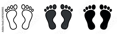 Pair of human feet imprints set in outline, dark grey, and solid black. Simple walk or step concept illustration.
