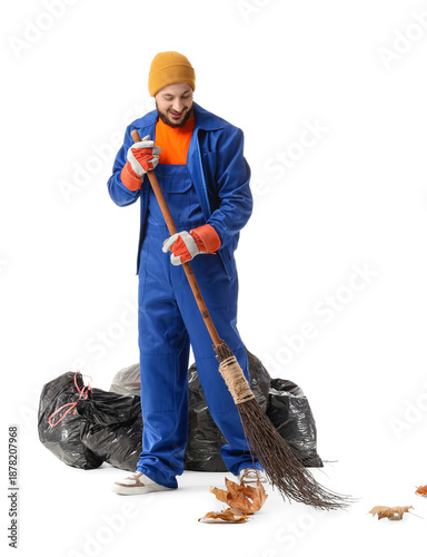 Male scavenger with broom a...