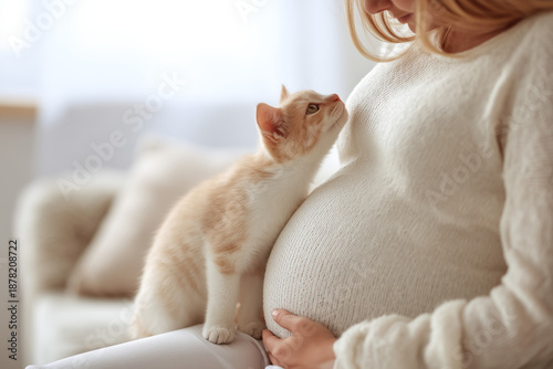 Pregnant woman with kitten, cozy maternity scene, beige tones, light background