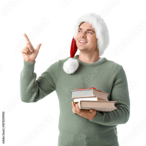 Young man in Santa hat and ...