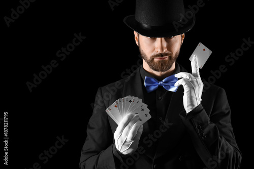 Male magician with playing ...