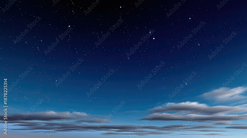 Naklejka premium Night Sky with Stars and Soft Clouds at Dusk, a Serene View of the Universe Above, Ideal for Calm and Peaceful Backgrounds and Designs