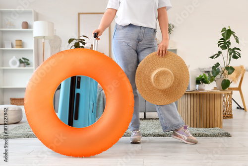 Young woman with beach acce...