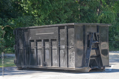 close up on dumpster at construction site 
