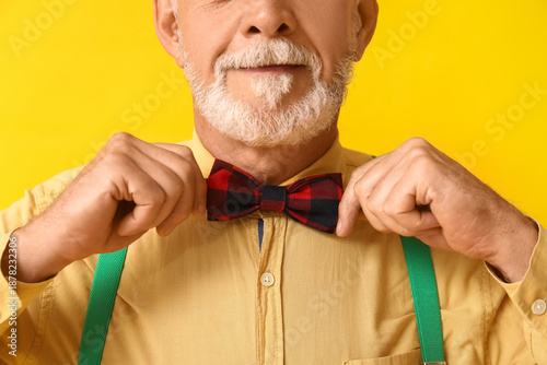 Handsome happy mature man w...