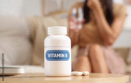 Bottle with vitamin B bills...