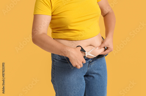 Overweight woman in tight j...