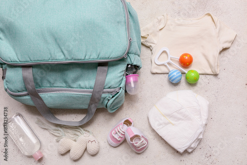 Baby bag with diapers on wh...