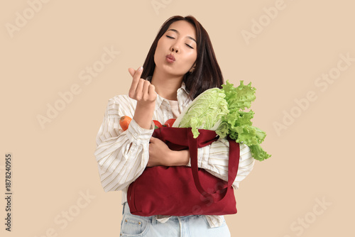 Young Asian woman with red ...