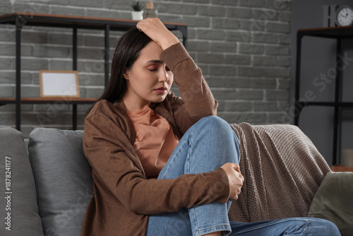 Depressed young woman on so...