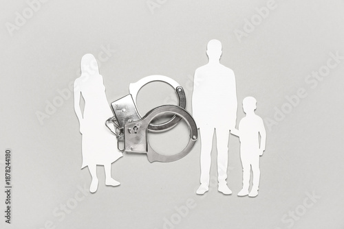 Family figure and handcuffs...