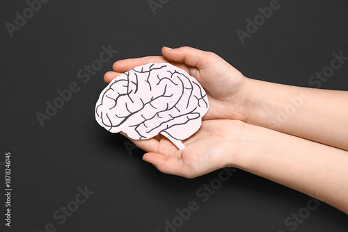 Female hands with paper hum...