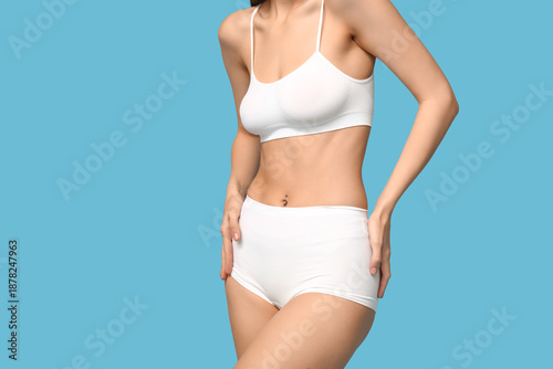 Young woman in underwear on...