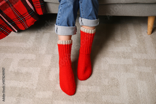 Woman in red knitted socks ...