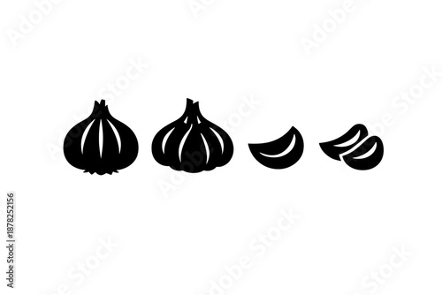 Black silhouette of fresh garlic bulbs and peeled cloves used for seasoning food