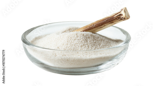 Konstfotografi Shallow Glass Bowl Filled With Fine White Sand And Single Wishing Bone Resting On Top