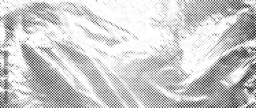 Halftone creased cellophane overlay. Dotted crumpled plastic texture. Old rough wrinkled film background. Aged creasy surface in comic pop art style. Grainy cartoon gritty paper wallpaper. Vector
