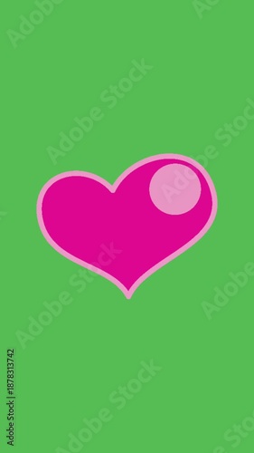 Pink heart symbol animation pulsating on a vertical green screen