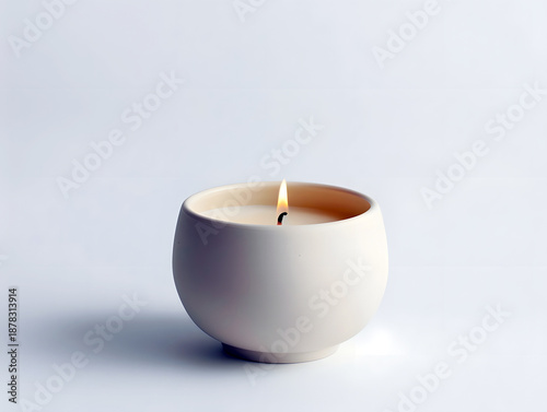 Wallpaper Mural Elegant scented candle in ceramic bowl burning with soft flame on neutral background Torontodigital.ca