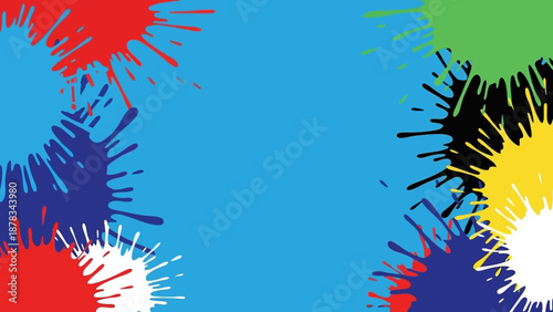 Vibrant paint splatters in various colors against a bright blue background, showcasing dynamic movement and creativity from a close-up viewpoint.