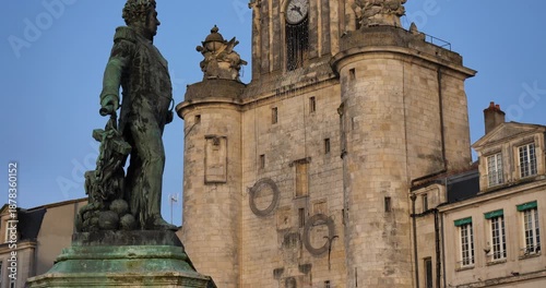 The Grosse Horloge tower and the admiral Duperre statue. La Rochelle,Charente Maritime department, Region Nouvelle Aquitaine, France