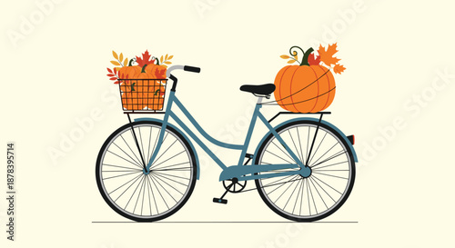 Classic blue bicycle decorated with autumn pumpkins and colorful fall leaves in the basket and on the rear rack for seasonal decoration.