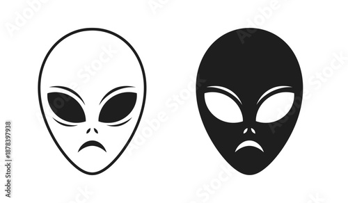 Two alien masks in black and white with a neutral expression